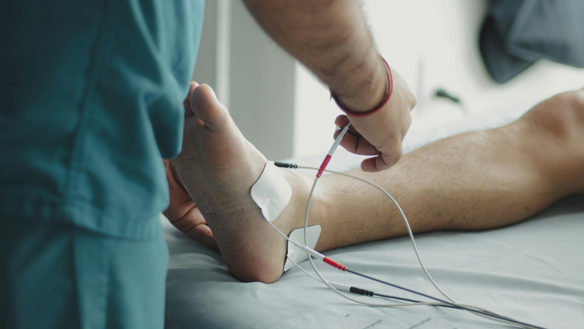 Medical procedure with electrodes on a patient’s foot