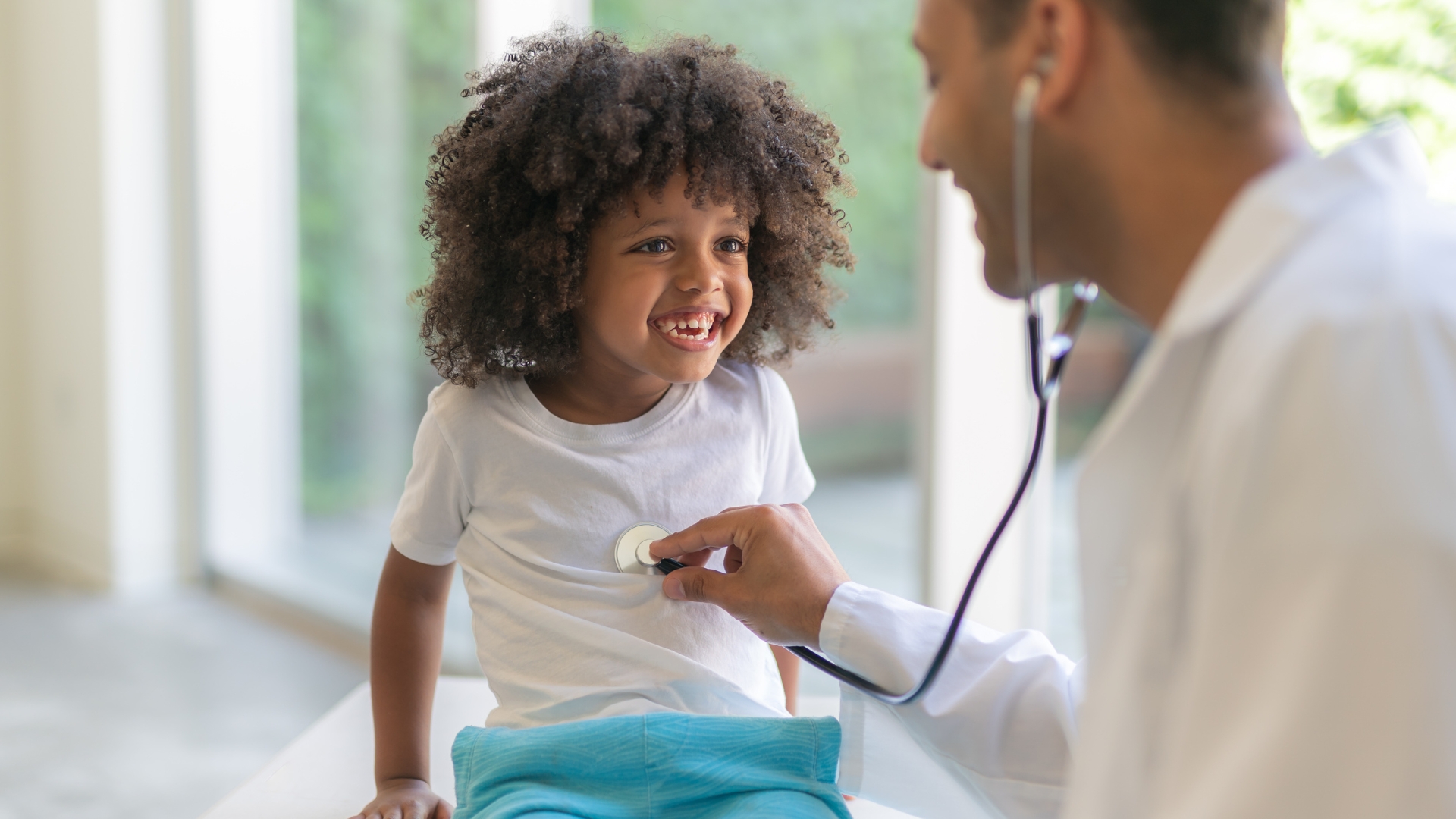 Smiling child during a medical exam